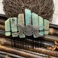 Close-up of bohemian natural crystal hair comb with silver goddess moon detailing - Amazonite Black Wire Silver Moon