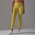 Vue détaillée du legging de yoga moutarde à taille haute sans couture avec effet push-up - XS / Citron Vert Clair