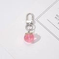 Pendentif pêche en résine rose avec feuilles vertes et fermoir mousqueton en argent - Pêche