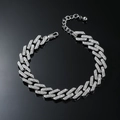 Cavigliera cubana argentata da uomo con zirconi brillanti incastonati su sfondo nero lucido - Cavigliera in strass a doppia fila a rombi / Argento