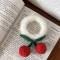 Detail of handmade crochet cherry hair tie with soft white plush band and knitted red cherries - Faux Rabbit Fur/Woolen Yarn / Cherry White Plush Scrunchie