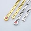 Close-up of gold and silver 11mm Cuban chains featuring a red crystal skull clasp - Bracelet 21cm / Steel Color/Red Crystal Buckle