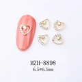 Detail of 6.5mm heart-shaped golden alloy nail charms with iridescent crystal inlay - Gold Aurora Polar Diamond Heart (8898)