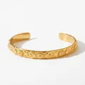 Adjustable golden cuff bracelet with celestial sun and moon patterns and zircon stones - Celestial Mix Relief (KA1223)