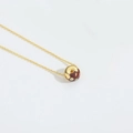 Minimalist golden doughnut pendant necklace with reddish brown enamel and colorful dots - Chocolate Doughnut