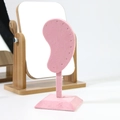 Pink velvet ear-shaped earring display stand with a stable square base for jewelry - Light Pink