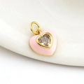 Macro shot of 18k gold plated pink enamel heart pendant with a central heart zircon - 04-Pink Heart with Zircon
