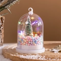 Close-up of a Christmas snow globe night light with a mini tree and colorful LED lights - Multicolor Light (Style E)