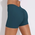 Detailaufnahme der High-Waist V-Cut Yoga-Shorts mit Scrunch-Effekt in dunklem Petrol - S / Dunkles Blaugrün