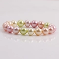 Elegant multi-color shell pearl bracelet featuring pink, green, and beige beaded pearls - Pink/Light Green/Beige