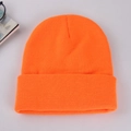 Close-up of bright orange ribbed knit beanie showing soft texture and premium quality - Adult 56-60cm / Orange