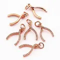 Pendentifs en forme d'os de vœux or rose sertis de zircons pour création de bijoux - Os à vœux / Or rose