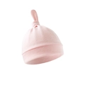 Macro detail of soft pink cotton newborn hat featuring a top knotted tail design - Light Pink