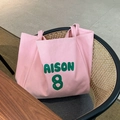 Roze canvas tote bag met groene Maison 8 opdruk op een getextureerde stof - Roze