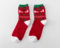 Thick red coral fleece Christmas socks featuring white reindeer and green heart patterns - One Size / Sock Top Heart