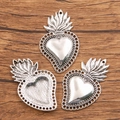 Silver flame heart pendants for DIY jewelry making on a wooden background - 15C6-6 Hollow Beaded Heart