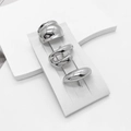 Three-piece minimalist silver metal ring set featuring polished fluid geometric designs - 3-Piece Ring Set / Silver