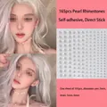 Self-adhesive white pearls set for face and body in mixed sizes for music festival makeup - 165 Mixed Size Faux Pearl Stickers