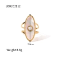 Detail view of oval mother-of-pearl 18K gold ring with dimensions 2.8cm and 4.8g weight - Sun Star White Shell Style (JDR202112)
