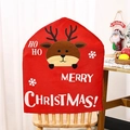 Detail view of red Christmas chair cover featuring cartoon elk and Merry Christmas text - Elk Style