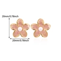 Detailed view of 20mm flower stud earrings with pink enamel and pearl center in gold - Earrings / Taro Purple