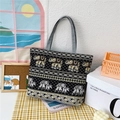 Large black canvas tote bag with golden ethnic elephant print and grey handles - Elephant