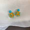 Macro detail of gold floral stud earrings featuring vibrant turquoise resin flower clusters - Resin Flower Cluster Stud Silver Earring Post - Gold Blue (53#)