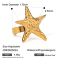 Dettaglio anello stella marina dorata con larghezza 2,55 cm in acciaio inox impermeabile - Anello Stella Marina Dorato / Regolabile