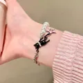 Y2K style black cat pearl bracelet with pink star charm and metal chain for women - Pearl Splicing Kitten Bracelet