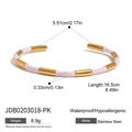 Detail of bamboo joint style pink enamel open bangle in gold-plated stainless steel - Color Block Bangle (JDB0203018-PK) / Pink White Gold