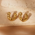 Gold hollow heart earrings with hammered lava texture on stone and silk background - Lava Texture C-Shaped Style / Gold