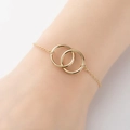 Bracciale minimalista in acciaio inossidabile placcato oro 18k con anelli incrociati - Oro