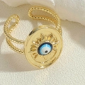 Goldener Evil Eye Ring mit gedrehtem Band und Sonnenstrahlen-Design für Damen - Königsblau Emaille