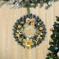 Close-up of green Christmas wreath with gold ornaments and Merry Christmas sign - Gold Flower Style / 42*42*8cm