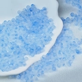 Detailed macro of light blue semi-transparent frosted round glass beads for DIY jewelry making - Blue Two-tone Beads (6mm)