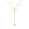 Detail of gold double-layer necklace with irregular pendant and white natural stone bead - Opal Natural Stone