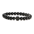 Vista dettagliata del bracciale elastico con perle lisce e rotonde di onice nera - Finta agata