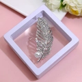 Elegant silver feather brooch with sparkling crystals and a white pearl accent - XZ069 Silver-Silver Feather-Boxed
