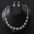 Elegant silver necklace and earrings set with black round stones and clear crystals - Black