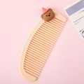 Cute beige mini crescent hair comb featuring a cartoon brown bear with a pink hat - Bear