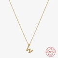 Macro view of textured S925 sterling silver letter W pendant necklace with zircon stones - Gold - Letter W