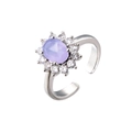 Oval purple zircon ring with a floral halo of clear stones on an adjustable silver band - Silver Band/Light Purple Gemstone