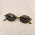 Retro olive green oval sunglasses for children featuring vintage thick plastic frames - Green