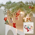 Catena luminosa a LED natalizia in legno con Babbo Natale, pupazzo di neve e campanelli - Set Assortito di Natale