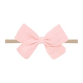 Close-up of pink textured cotton bow on beige soft seamless nylon headband for baby - Pink
