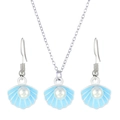 Silver shell jewelry set with light blue shells and white pearls on a white background - Silver Tone Blue Shell