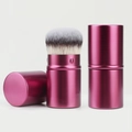 Detail view of pink retractable makeup brush with bristles, cap and closed state - Burgundy Round Style (30#)