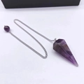 Amethyst hexagonal crystal pendulum necklace with silver chain and purple bead detail - Amethyst