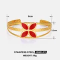 Detailed view of 18k gold plated stainless steel cuff with red clover motif and dimensions - Gold Red Four Leaf Clover