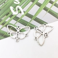 Pair of silver butterfly alloy charms for DIY ethnic jewelry making in vintage style - Hollow Butterfly 17x24mm